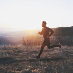 Man going for a run on a trail