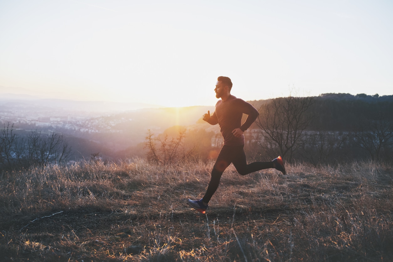 Man going for a run on a trail