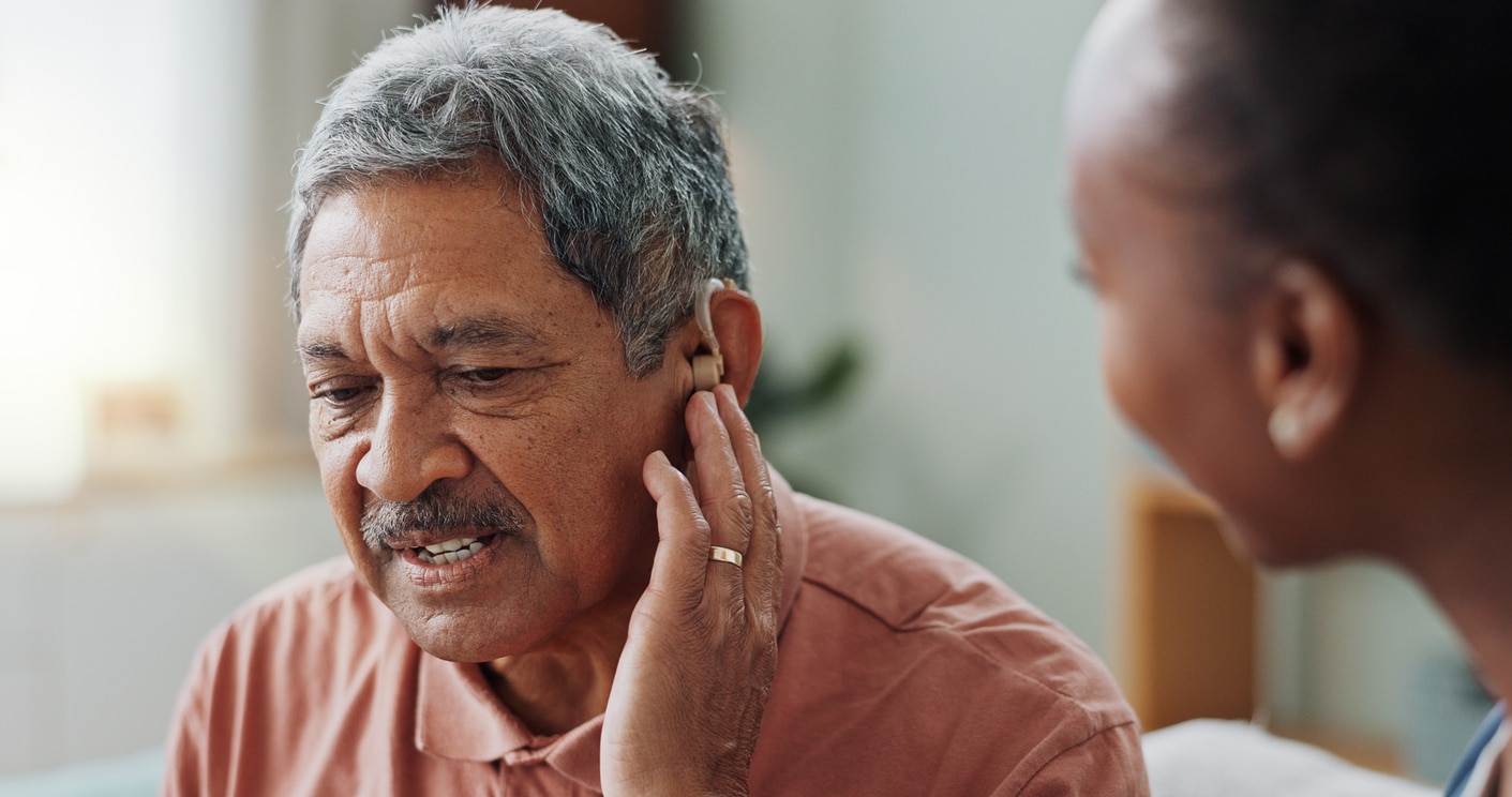 Man with hearing loss at doctor