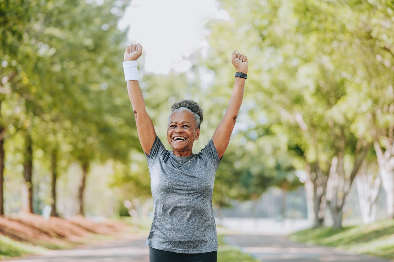 Senior woman running happy.